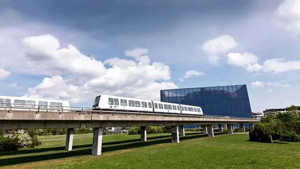 Metro Header two trains passing outside