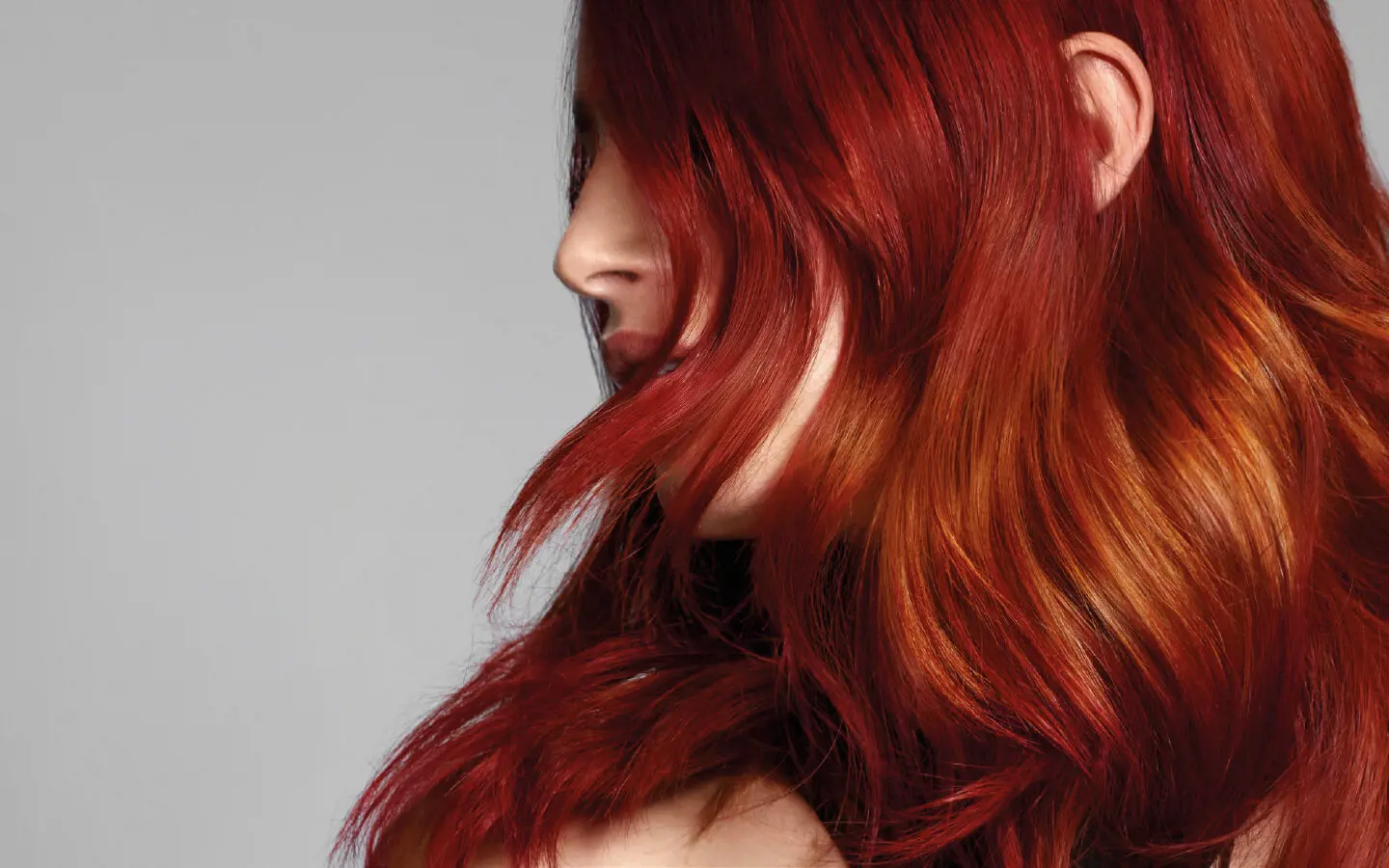 woman with red hair from the side 