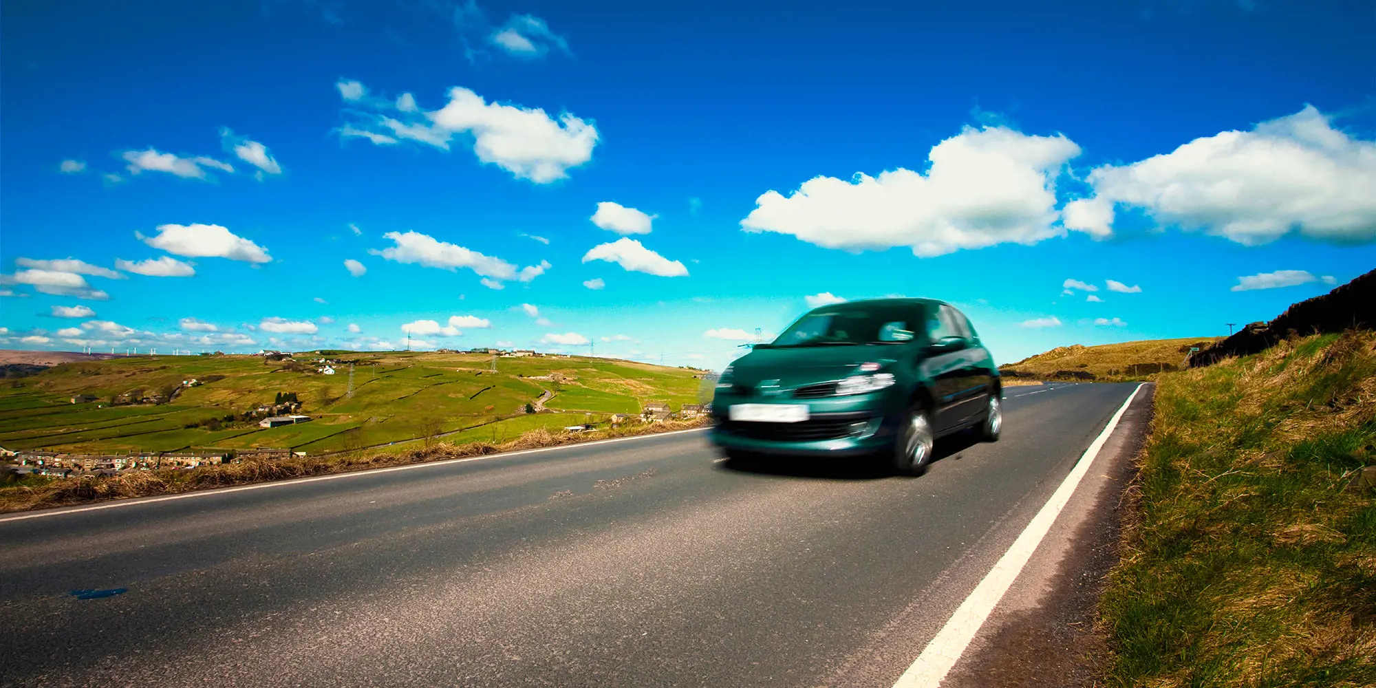 a car driving on a road 